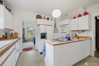 A cheery kitchen provides everything you need at your fingertips.