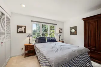 A generous primary bedroom has plenty of room for all your bedroom furniture.