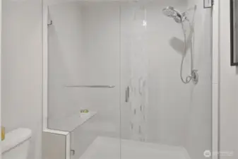 Stunning shower with bench