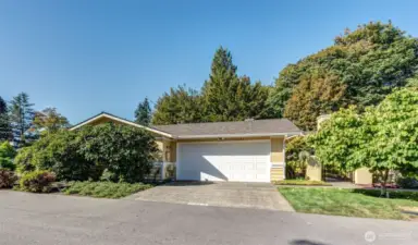 Great Level Site, No steps! 2 Car Garage with 2 spots in driveway.