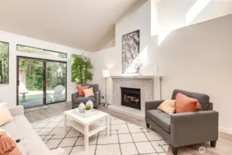 Wood burning fireplace and slider to patio
