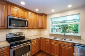 Enjoy a beautiful view of the backyard from the bay window above the sink.