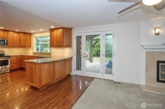The door opens to a spacious 1,000 SF deck and features a sleek design with side windows and dual-opening panels.