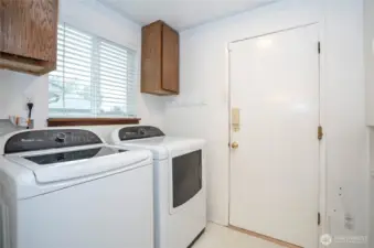 Utility room with convenient direct access to the garage.