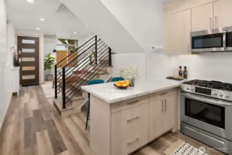 View of main floor from kitchen virtually staged.