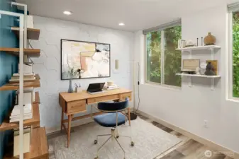 Bedroom two virtually staged as an office.  Built in shelves are real and convey with the property.