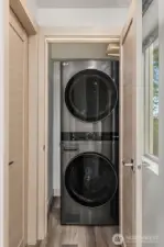 Full size washer dryer on third floor.