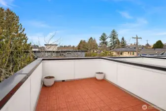 Large roof top deck area on the north side of property with sufficient space for table and furniture.