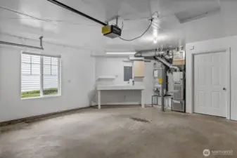 Full 2 car garage with workspace