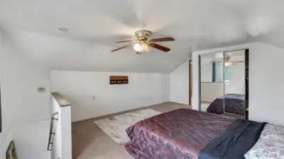 This home offers 2 staircases leading up to each bedroom on upper level.