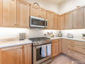 Updated stainless kitchen appliances replaced just 3 years ago for modern convenience.