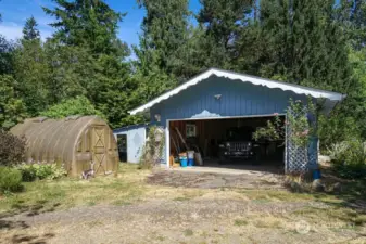 Detached garage could fit 4 cars 2 car deep, wonderful greenhouse & lean to for animals or storage