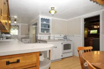 kitchen with plenty of Sitka cedar cabinets & frig & full size freezer