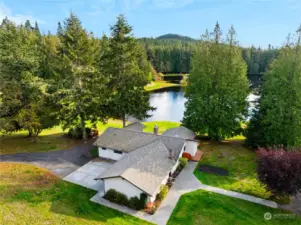 One level home with attached 2 car garage nestled just steps from this magical lake. Enjoy the peace and  tranquility!