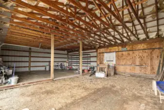 Covered storage off of the barn, includes extra parking for your tractor, etc.