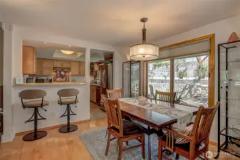 Dining area is spacious and open, with a breakfast bar nearby for entertaining!