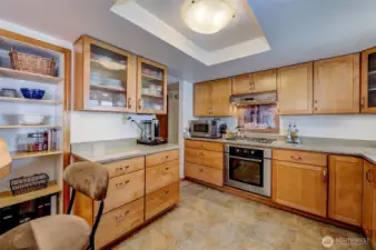 Custom cabinetry, soft-close drawers, quartz, gas range, Bosch appliances, open plan...what more could you want?