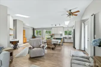 View living room to open kitchen