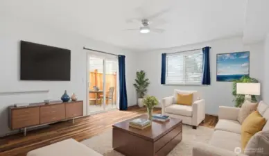 Downstairs family room - virtually staged.