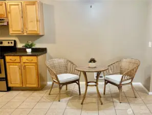 The dining area is spacious enough for a smaller table or a large table.  It is flexible for your dining and entertaining needs.