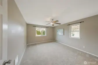 With this being an end unit the primary bedroom enjoys 2 windows and can easily accomodate a king size bed.