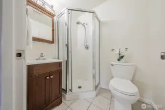 The primary bath has easy access from the primary bedroom.