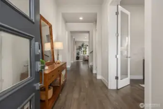 A gracious entry with a French doors leading to your dedicated office on the right