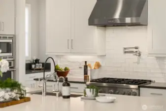 Endless possibilities in this epicurean delight of a kitchen!