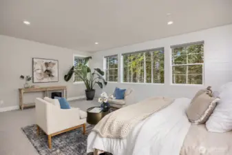 Primary suite with private and verdant views of the trees beyond your backyard