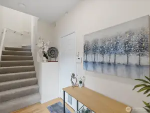 Entry, door to garage is on the right.