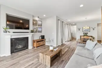 Expansive open-concept layout connecting living, dining, and kitchen areas.