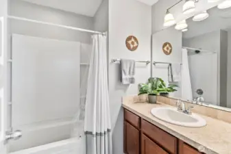 Full bathroom with modern fixtures and clean finishes.