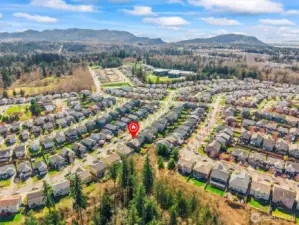Elevated aerial showcasing proximity to open space and scenic surroundings.