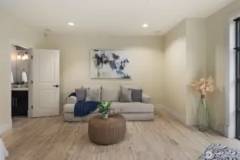 Versatile entry level bedroom can be an office, bedroom, or bonus room.