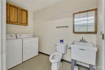 2nd level bathroom with washer & dryer.