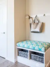 Entry level foyer complete with built in bench and storage plus large entry closet. This is an actual foyer entry instead of walking into a living room as your entry.