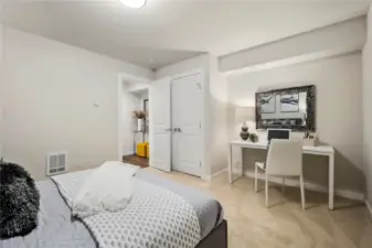 VERY large main level bedroom.  Perfect as an office, MIL area, Media room, etc.  This bedroom is on the entry level with its own bathroom.