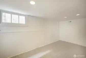 New carpets on lower level. Non conforming space but great use of office or den. Has 3/4 bath off room.