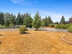 Large fully fenced Yard.
