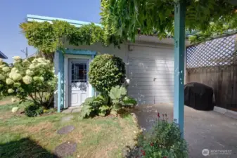 Entrance to the extra sleeping room and garage/workshop