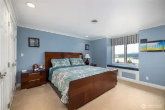 2nd bedroom with large closets and a view of the lake.