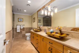 Guest bathroom with double sinks.