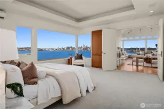 Wake up daily to these unbelievable views without even getting out of bed. A custom tv cabinet is behind the double doors.