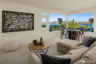 The rec room is gigantic and features great views, new carpet and new paint. (The entire house features new paint, refinished hardwoods and new carpet)