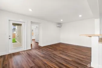 The home features: a heat-recovery ventilation system, a highly efficient mini-split heat pump- pictured here, and efficient light as well!