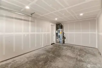 There's also an attached 1-car garage off the ground floor. You can also see the high-efficiency heat pump water heater here as well!