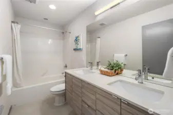 Main hall bath on the second floor with bathtub and double vanity!