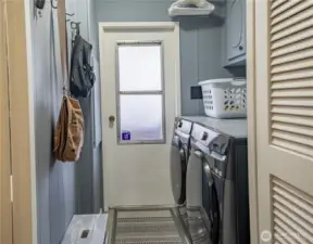 Laundry room and door to carport
