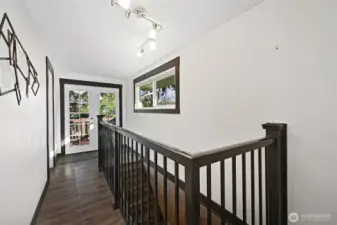 Upstairs, you'll find 2 rooms, including the Primary Suite.