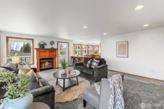 Easy to entertain with living area just off kitchen.